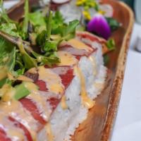 Vanessa Roll · Shrimp tempura, krab salad, topped with seared tuna spring mixed salad served with chef crea...