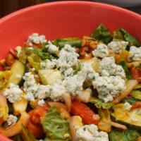 Peachtree Bleu Salad · Crisp romaine lettuce, bleu cheese crumbles, bacon, egg, tomatoes, cucumbers, red onions, ca...