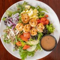 Grilled Shrimp Salad · Baby field greens, roasted red peppers, red onions, sliced almonds, eggs, black olives, toma...