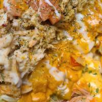 Crab Meat And Shrimp Nachos · This is not your traditional chicken or beef nachos.   The nachos are made with lumped crab ...