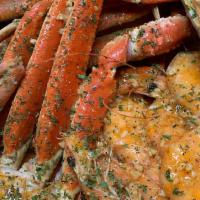 Seafood Boil Pan (Big Daddy) · Snow crab cluster, 1/4 pound of shrimp, 1 blue crab, crawfish, sausage, corn, potatoes & lem...