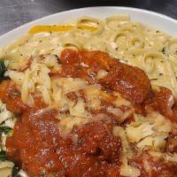Chicken Parmesan · Includes a breaded chicken breast, smothered in marinara sauce, topped with mozzarella chees...