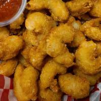 Popcorn Shrimp  And Fries · Fried popcorn shrimp and fries served with SanChe’s seafood sauce.