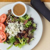 Dog House Salad · The dog rules the house with this mix of lettuces, dried cranberries, candied pecans, bacon,...
