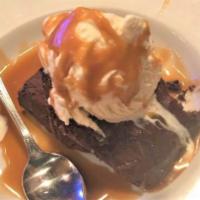 Chocolate Brownie · Vanilla ice cream is piled on this warm, rich, triple-chocolate brownie and topped off with ...