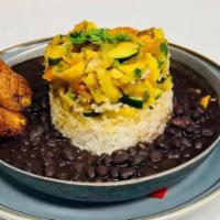Pabellon Sifrino (Venezuela) · Sautéed pulled  beef or Chicken  or Vegetables in a sofrito mix, served with rice, black bea...