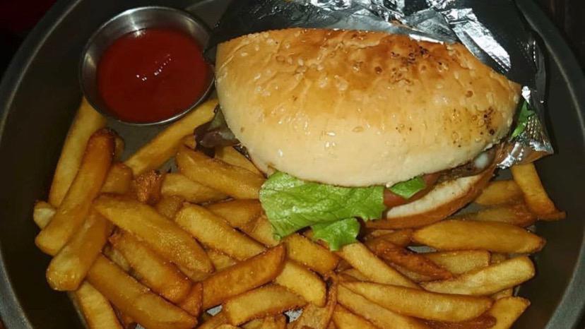 Hamburguesa De Bolivar (Colombia) · Grilled ground Angus beef, sliced Colombian chorizo melted White cheese, pineapple sauce, tomato, onions served with seasoned fries.