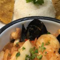 Mariscos O Camarones Al Ajillo (Chile) · Mixed seafood  or Shrimp sautéed in “hogao” garlic creole broth served with white rice and c...