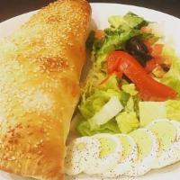 Calzone · Mozzarella cheese and our famous pizza sauce. Comes with 2 free toppings.