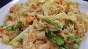 Thai Fried Rice Lunch Special · Thai jasmine rice stir-fried with egg, scallions, peas carrots, and your choice of meat.