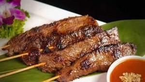 Beef Satay · Marinated with our house special soy sauce served with peanut sauce.