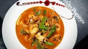 Tom Yum · Spicy. Hot and sour chili broth cook with pepper, onion, mushroom, and your choice of meat. ...