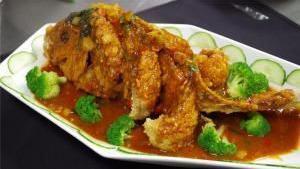 Red Snapper · Deep fried whole red snapper cook with diced pepper, onion and broccoli fresh thai basil wit...