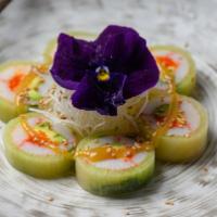 Kani Su · Imitation crab, avocado, masago wrapped in cucumber served with rice vinegar sauce.