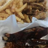 Wings N Ribs · 10 wings in your choice of sauce and 3 ribs in either Sweet BBQ or Buffalo BBQ with fries or...