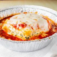 Homemade Lasagna · Beef, Ricotta, Mozzarella, sauce and Romano cheese.