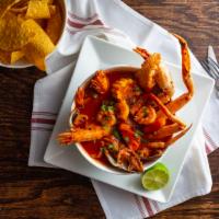 Caldo De Mariscos · (seafood soup - spicy) shrimp, mussels, tilapia, crab, potatoes, zucchini, carrots, and brot...