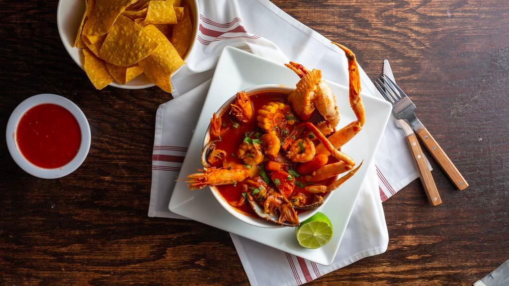 Caldo De Mariscos · (seafood soup - spicy) shrimp, mussels, tilapia, crab, potatoes, zucchini, carrots, and broth. Served with your choice of tortillas or bread.