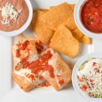 Chimichanga · Two crispy chimichangas with sides of red and cheese sauces, our Mexican salad mix, and beans.