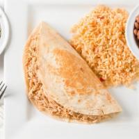 Supreme Quesadilla · Street style uncut quesadilla with sides of rice, beans, and our Mexican salad mix.