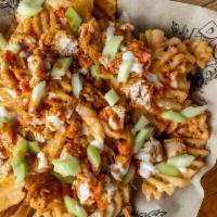 Dwg Ultimate Waffle Fries · DWG’s famous waffle fries. Fried golden crisp, topped with DWG boneless chicken tossed in yo...