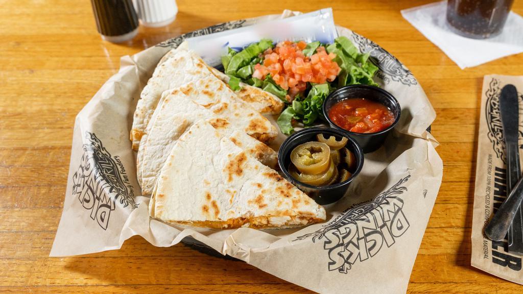 Dick’S Ultimate Quesadilla · Grilled flour tortilla, grilled peppers and onions, and shredded cheddar jack cheese stuffed with your choice of Philly steak, grilled chicken, blackened chicken or fried chicken. Served with salsa, sour cream, and jalapeños.