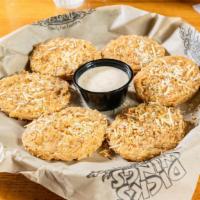 Fried Green Tomatoes · Fresh green tomatoes. Breaded, deep fried & topped with Parmesan cheese, garlic pepper flake...