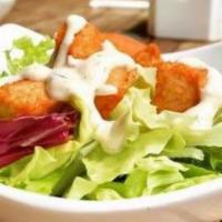 Chicken Caesar Salad · Romaine lettuce, parmesan cheese, croutons & caesar dressing & grill chicken.
