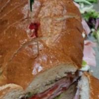 Italian Sandwich · HAM, SALAMI, PROVOLONE, LETTUCE, TOMATO, ONIONS, ITALIAN DRESSING.