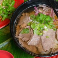 Vietnamese Pho Beef Noodle Soup · Rice noodles with slices of fresh round eye steak, onions, bean sprouts, basil, cilantro and...