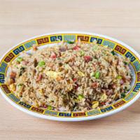 Chaufa De Chancho · Pork fried rice.