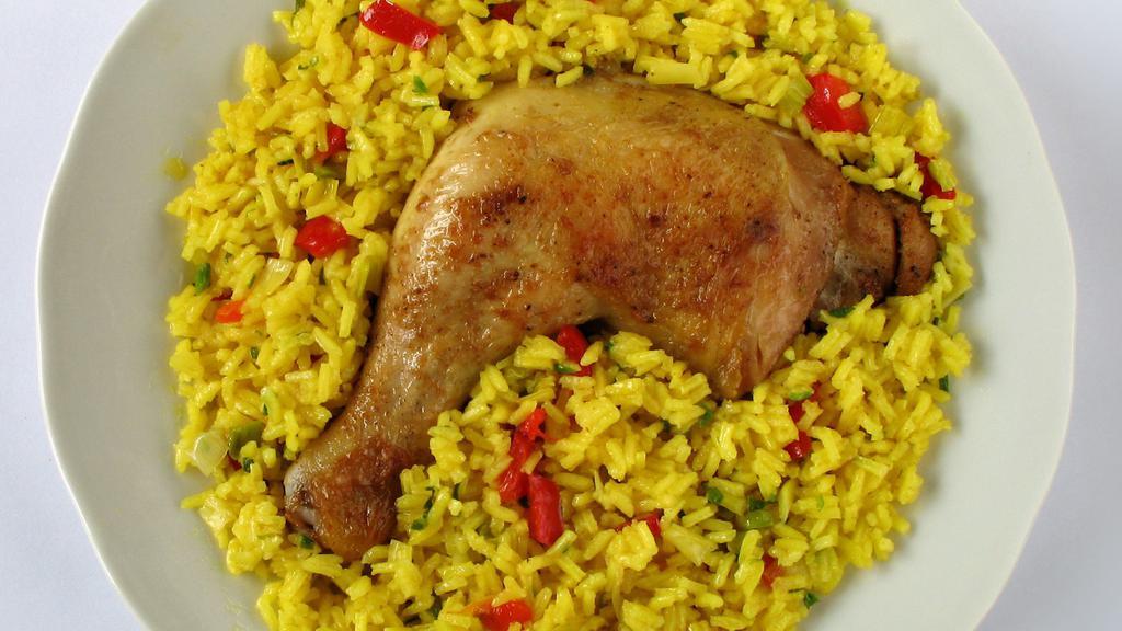 Arroz Con Pollo · Rich flavored rice with chicken and vegetables. .