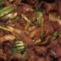 Mongolian Beef · Fresh scallion & onion w. tender sirloin steak in our special Mongolian sauce.