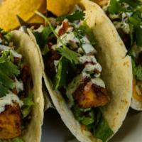 Fish Tacos · 3 fresh mahi-mahi tacos served with lettuce, pico de gallo and topped with a cilantro lime s...