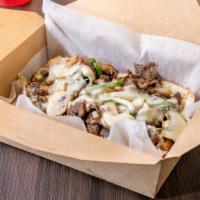 Steak Bulgogi Philly · Original 12 oz of Ribeye Philly w/ bell peppers, onion, mushrooms and white American cheese.