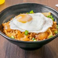 Kimchi Fried Rice · Fried rice with kimchi and egg on top.