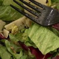 Small Salad · A mix of Romaine Lettuce, Radicchio, and Arugala with  Grana Padano cheese . Dressing is a H...