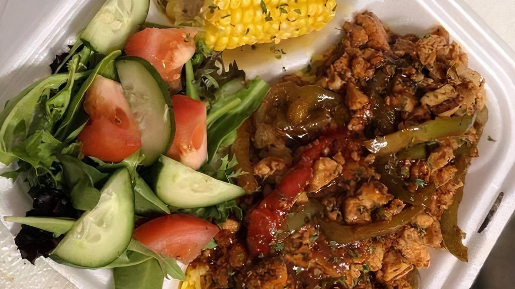 Boneless Bourbon Chicken · Grilled Chicken sautéed with Onions and Bell Peppers with Bourbon Sauce over Yellow Rice. Served over Yellow Rice with Tossed Salad, Corn on the Cob & a Dinner Roll (If we run out of Dinner Rolls, we will substitute with Garlic Toast)