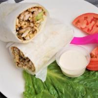 Chicken Shawarma Wrap · Chicken shawarma with lettuce, tomato, pickle, cucumber, spread of hummus and topped with ta...