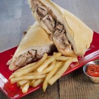 Pan Con Lechon · Marinated roasted pork, and grilled onions on toasted to perfection Cuban bread
