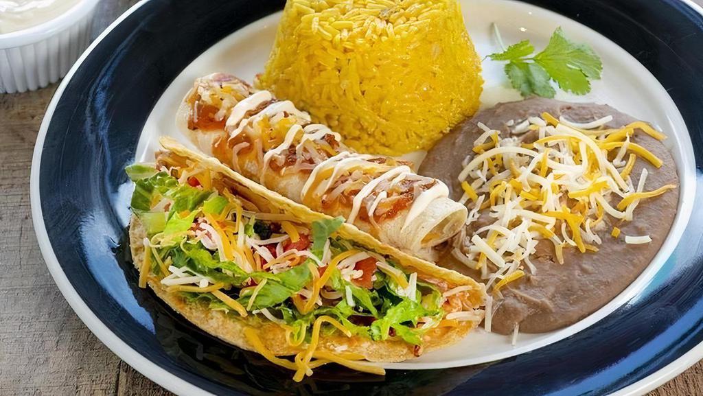 Taco & Enchilada Combination · One taco, soft or deep fried, and one enchilada with your choice of filling served with yellow rice, refried beans, and Mexican crema