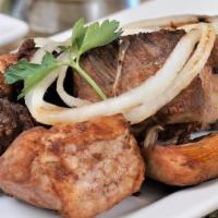 Pork Chunks · Masas de Puerco | Fried pork cubes and grilled onions