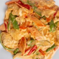 Panang Curry · Spicy. Sautéed bell pepper, carrot, fresh green beans & coconut milk in a homemade panang cu...