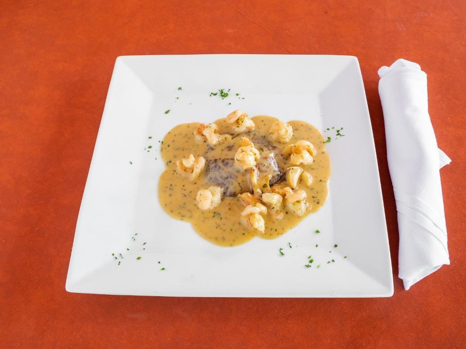 Portobello E Gamberretti · Sautéed Portobello cap with baby shrimp served in a garlic & lobster sauce
