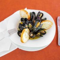 Mussels Mediterraneo · Mussels sautéed in a red or white wine sauce