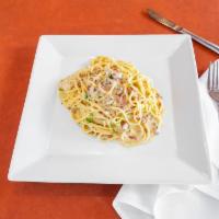 Spaghetti Carbonara · Spaghetti with bacon, onions, white wine, egg yolk & touch of cream