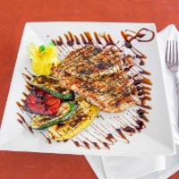 Pollo Primavera · Grilled marinated chicken served over grilled vegetables with a fig balsamic glaze
