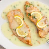 Chicken Francese · Boneless chicken breast dipped in egg batter and sautéed in lemon and wine sauce.