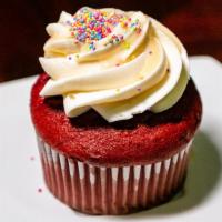 Red Velvet · Red velvet cake filled with cream cheese topped with cream cheese.