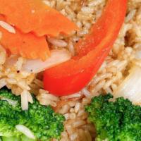Fried Rice · Gluten-Free. Stir-fried rice, onions, green onions, carrots, and green peas.